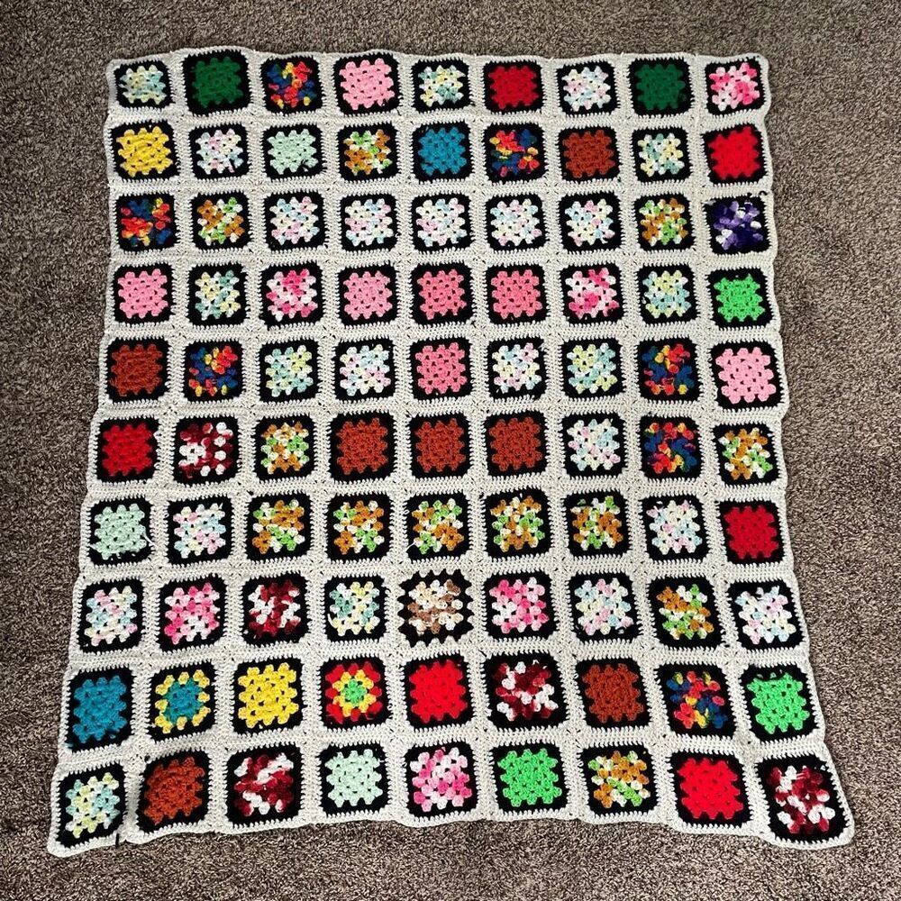 Colorful black/cream granny square blanket